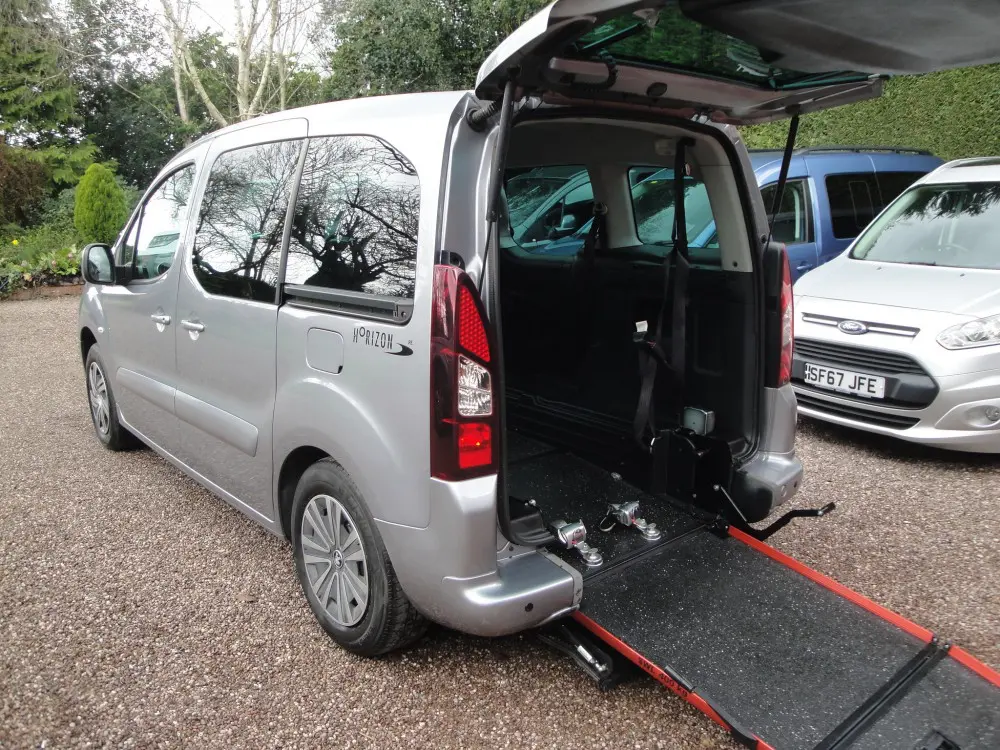 A wheelchair-accessible vehicle with its ramp lowered